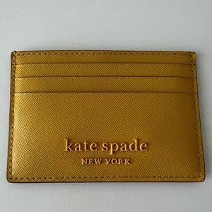 New Kate Spade mustard colored card wallet